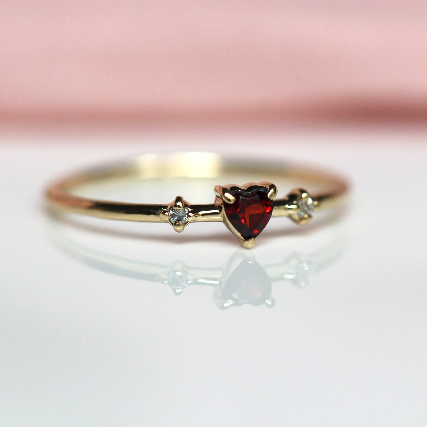 Garnet Heart Three Stone ring